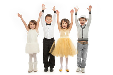 Obraz premium Group of happy kids in celebratory clothes.