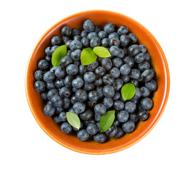 blueberries in a clay bowl