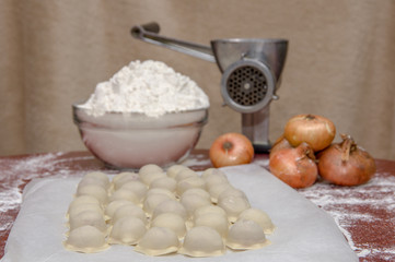 Fototapeta na wymiar Russian dumplings. The process of cooking.