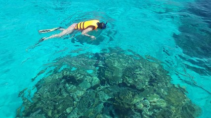 Woman snorkeling in the sea