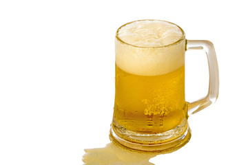 Frosty glass of light beer set isolated on a white background