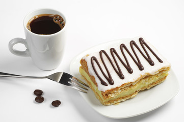 Coffee and creamy cake with chocolate