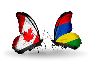 Two butterflies with flags Canada and Mauritius
