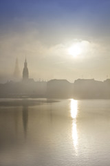 Fototapeta na wymiar Dense fog over the Alster