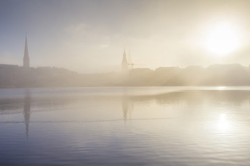 Naklejka premium Dense fog over the Alster