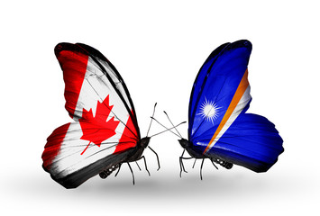 Two butterflies with flags Canada and Marshall islands