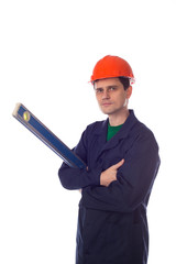 man in helmet and  blue robe holding building level