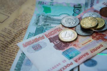 russian roubles banknotes and euro and dollars coins