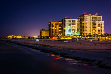 View of beachfront hotels and the beach from the fishing pier at