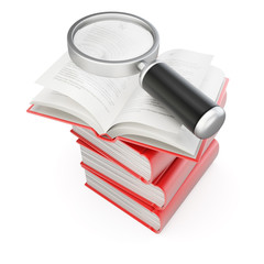 Stack of books with magnifier