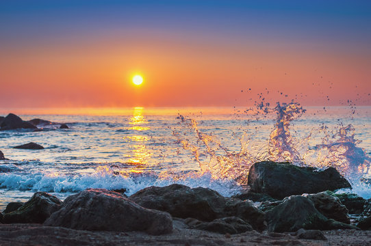 Fototapeta Scenic view of beautiful sunrise above the sea.