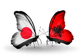 Two butterflies with flags Japan and  Albania