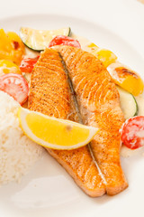 fish steak wit rice and vegetables