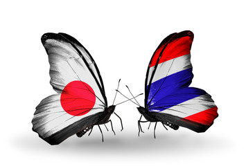 Two butterflies with flags Japan and Thailand