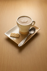 Capuccino and a wafer.