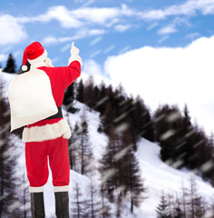 man in costume of santa claus with bag