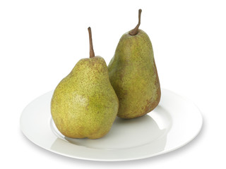 Green anjou pear on a white plate with clipping path
