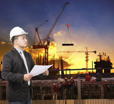 young engineer man working with construction plan in building st