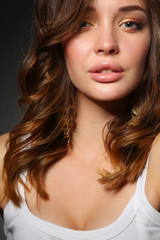 Obraz premium Close up portrait of beautiful young woman face. Isolated on