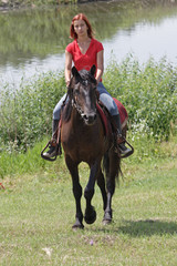 Young rider enjoys a warm summer day