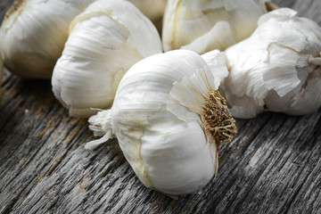 Garlic Bulb Close Up on Rustic Wood Background