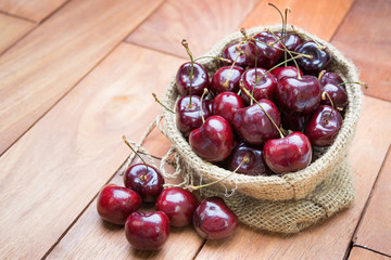 Fresh red Cherries on wooden