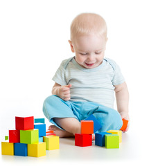 toddler kid boy playing  wooden toys