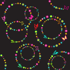 Seamless circular pattern with butterflies and flowers on a blac