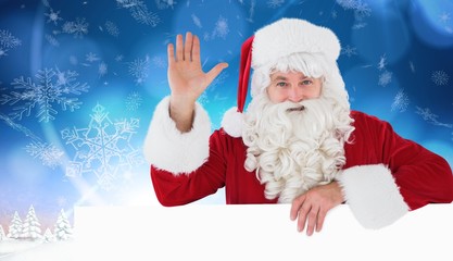 Composite image of portrait of santa claus waving