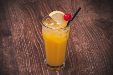 cocktail in high glass with straw