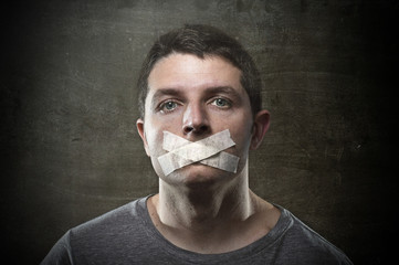 attractive censored man mouth tape sealed freedom speech concept - obrazy, fototapety, plakaty