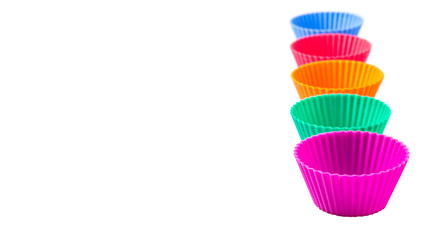 Cupcake silicone baking cups over white background 