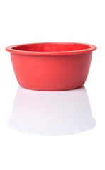 Red silicone muffin baking cup over white background
