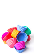 Cupcake silicone baking cups over white background 