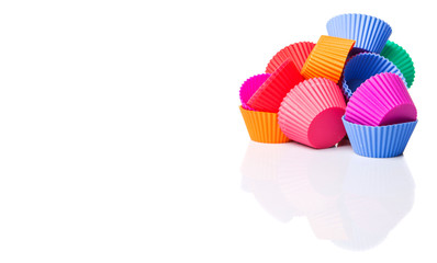 Cupcake silicone baking cups over white background