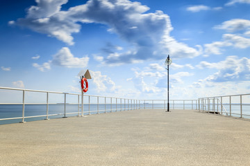 Fototapeta na wymiar Pier by seaside.