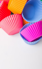Cupcake silicone baking cups over white background