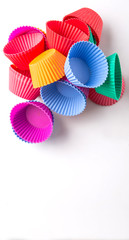 Cupcake silicone baking cups over white background