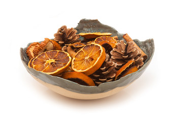 Bowl of pot-puri isolated on a white studio background.