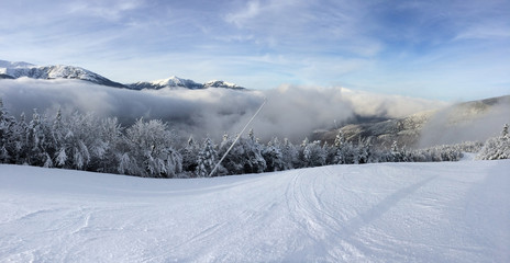 Snowy slope in the mountains