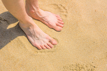 feet in the sand