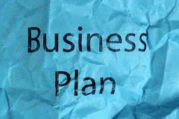 business plan text on blue paper