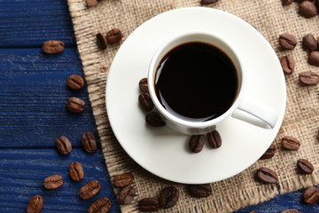 Cup of coffee on wooden table