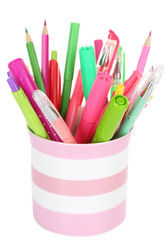 Colorful pens,pencils and markers in striped plastic cup