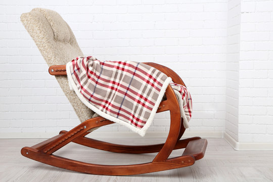 Comfortable rocking-chair with rug