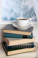 Naklejka na ściany i meble Composition of books and cup