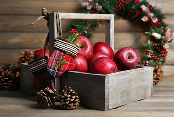 Christmas apples on wooden table © Africa Studio