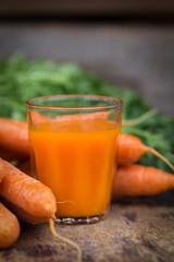 Carrot  on wooden background