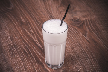 vanilla milk shake with straw