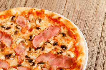 pizza on wooden background